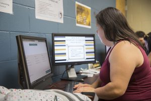 Student in front of a computer